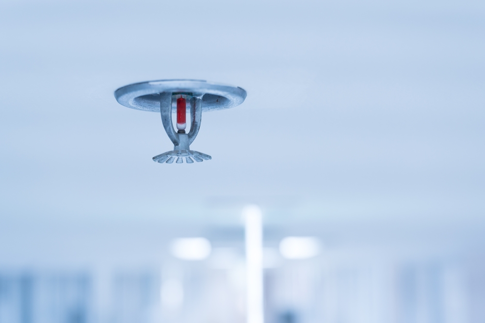 Fire,fighting,equipment,,sprinkler,on,white,ceiling,background.automatic,head,fire