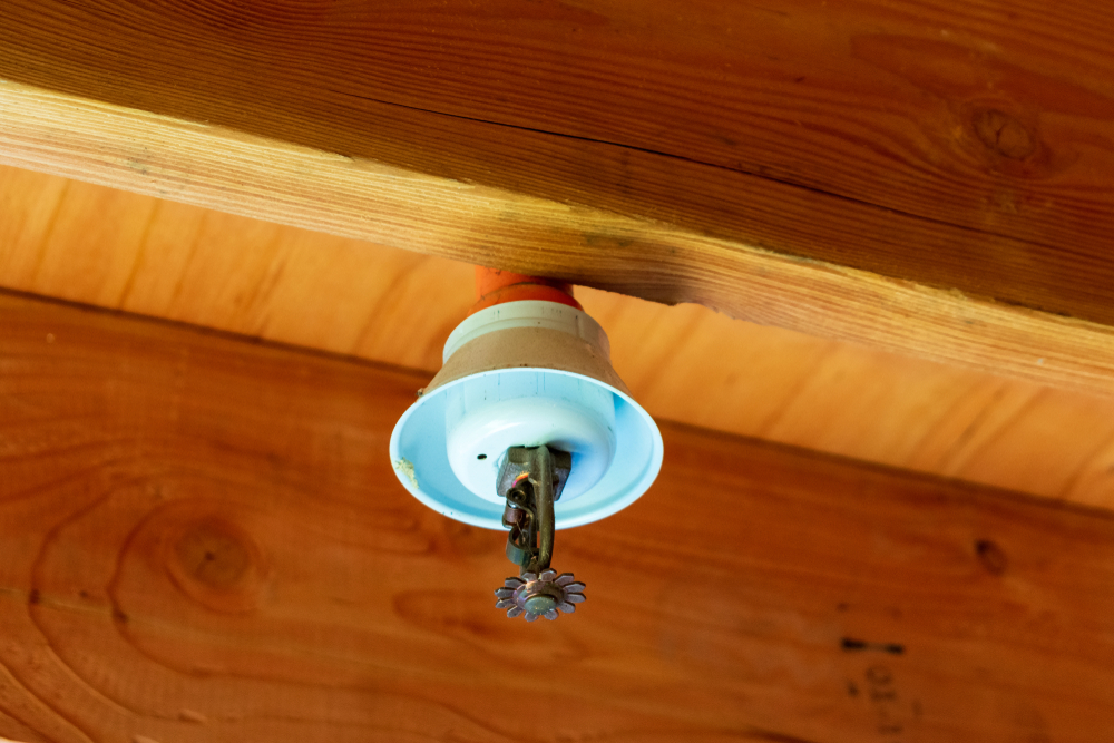 Automatic,fire,sprinkler,system,in,wood,framed,building,during,installation,